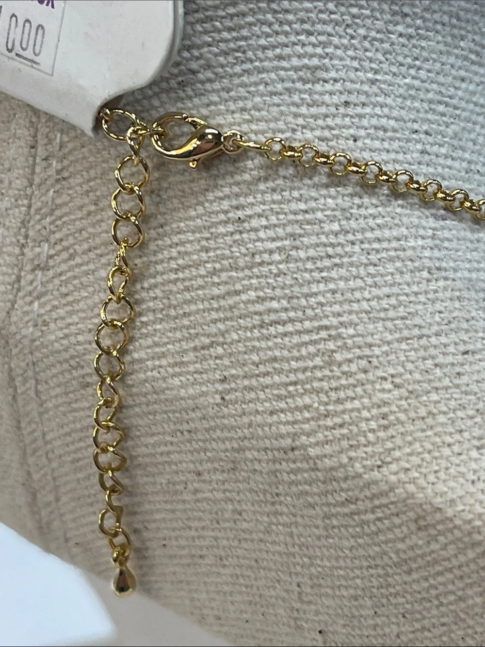 Gold-Tone Necklace with Beige Center and Green Crystal Halo
